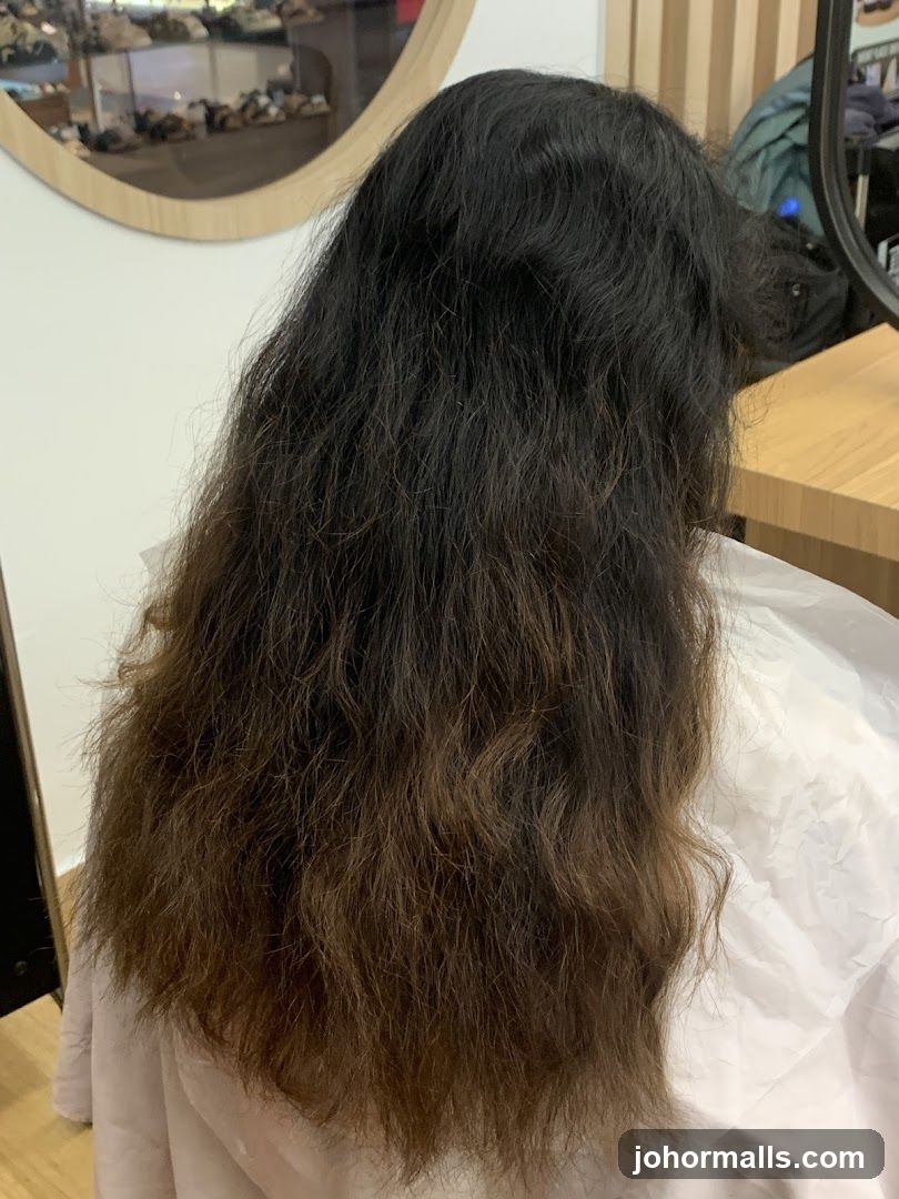 Woman's long, dark, wavy hair