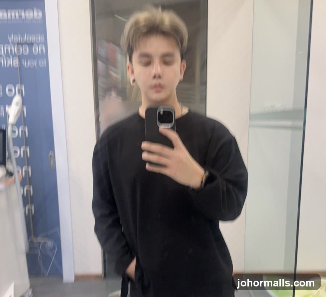 Man Taking Selfie in Salon