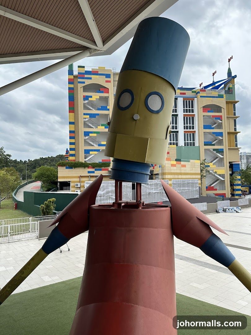 Robot Sculpture with Colorful Building