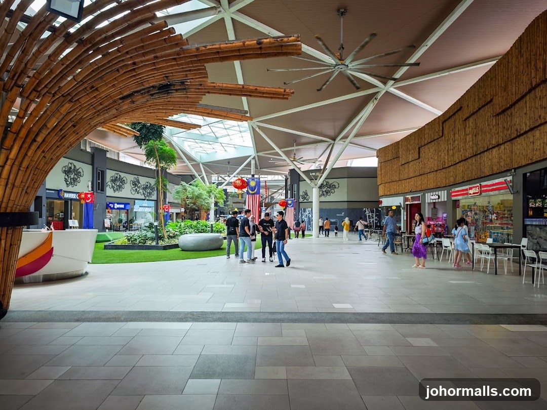 Indoor shopping mall with modern architecture and greenery