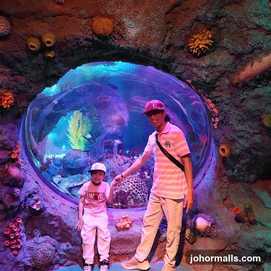 Father and Son at Aquarium