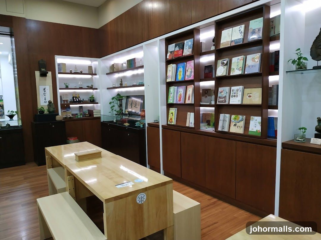 Interior of a shop with bookshelves and a table