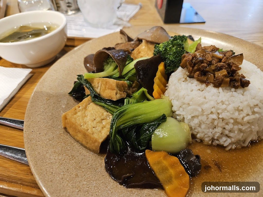 Rice dish with vegetables and soup