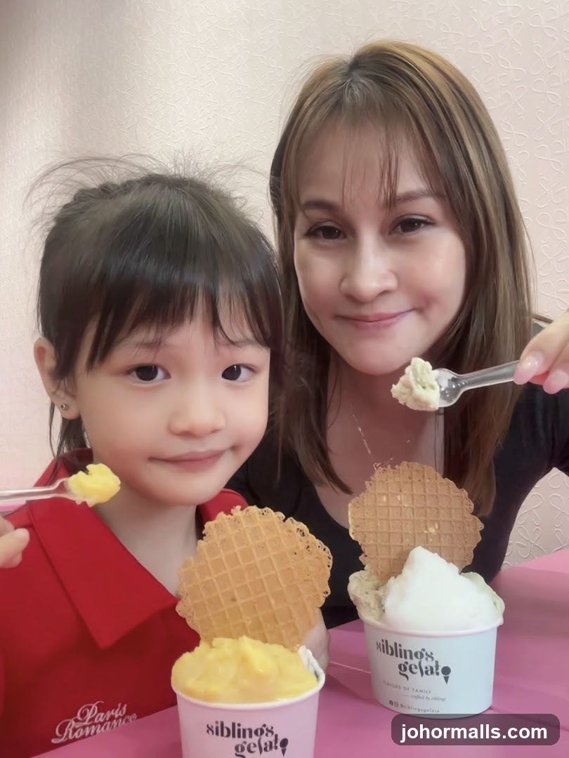 Mother and child enjoying gelato