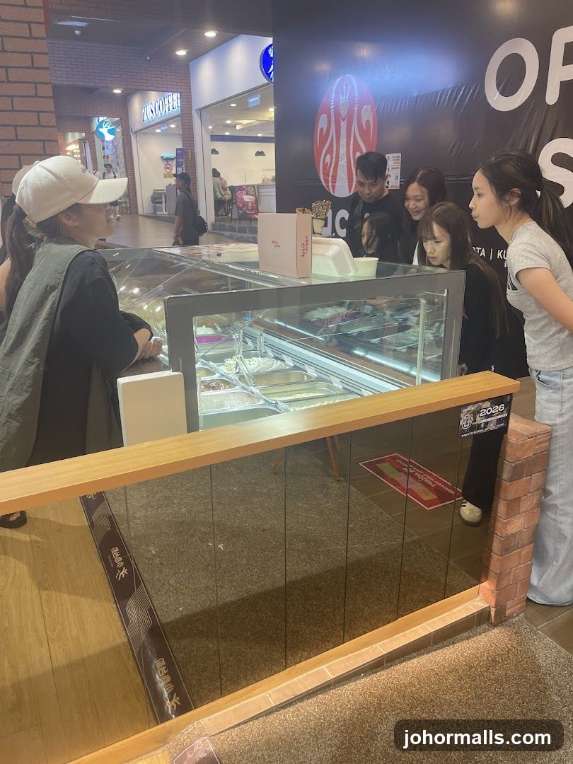 People looking at ice cream display