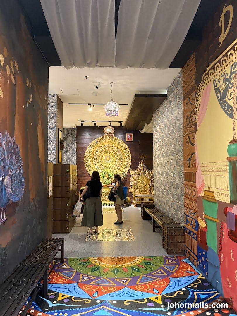 Hallway with ornate murals and decorations
