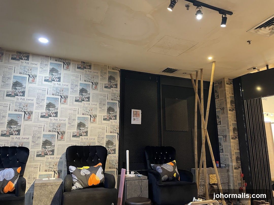 Waiting Area with Newspaper-Themed Wallpaper