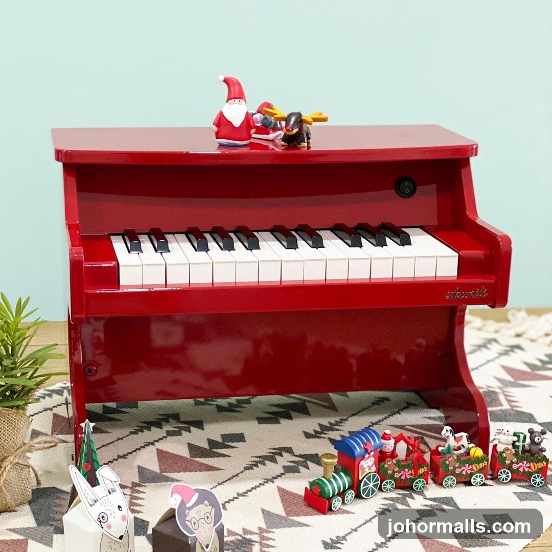 Red toy piano with Christmas decorations