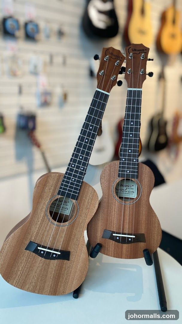 Two ukuleles on display