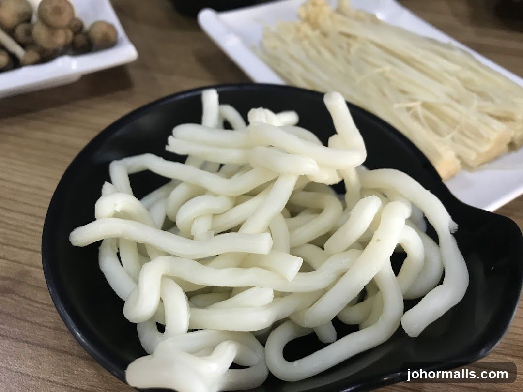 Udon Noodles and Enoki Mushrooms