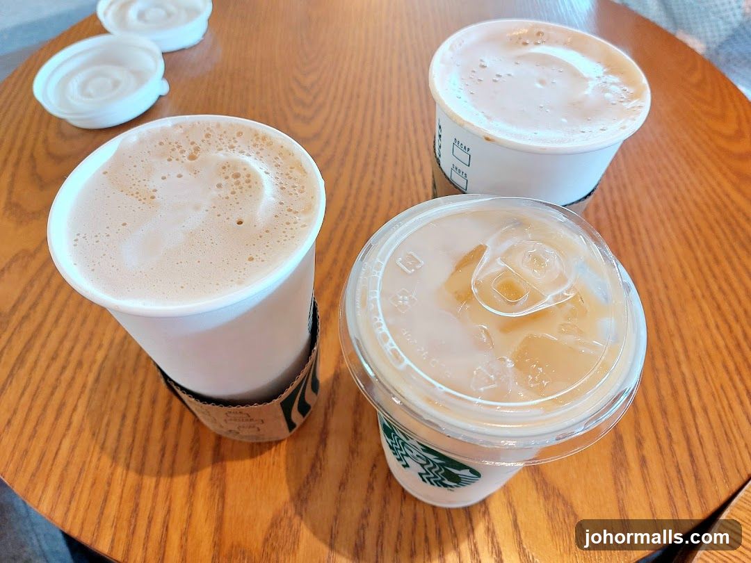 Three drinks on a wooden table