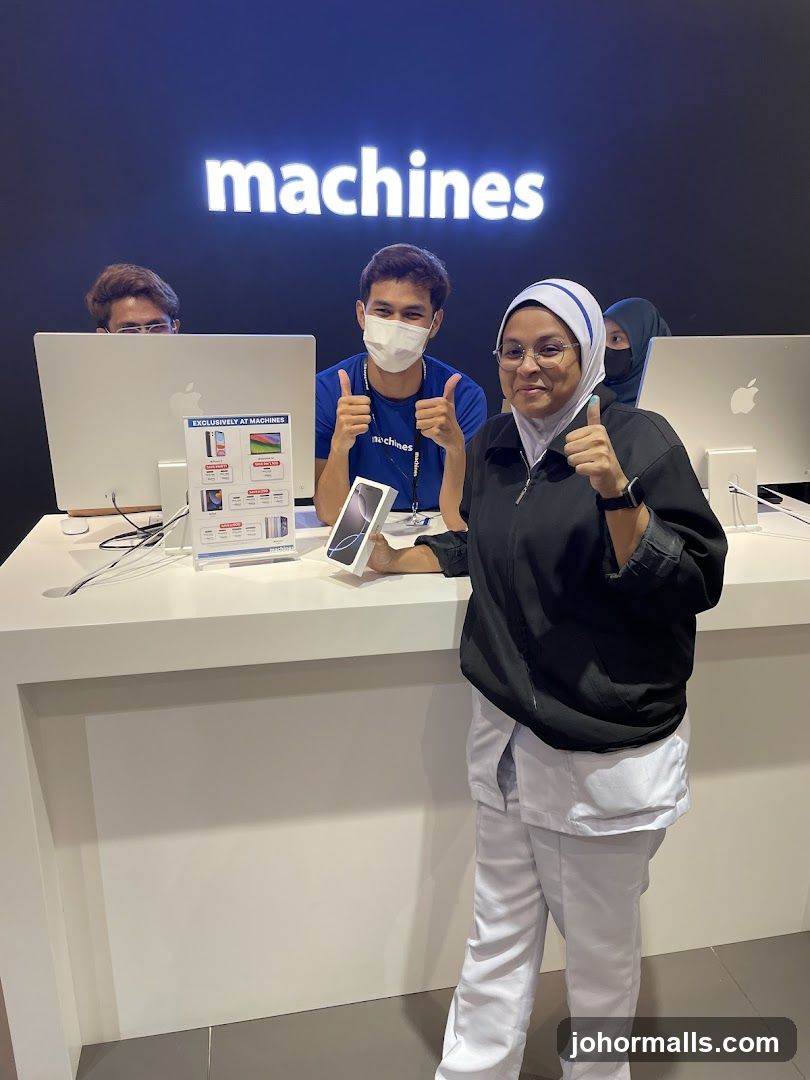 Customers and staff at Machines store