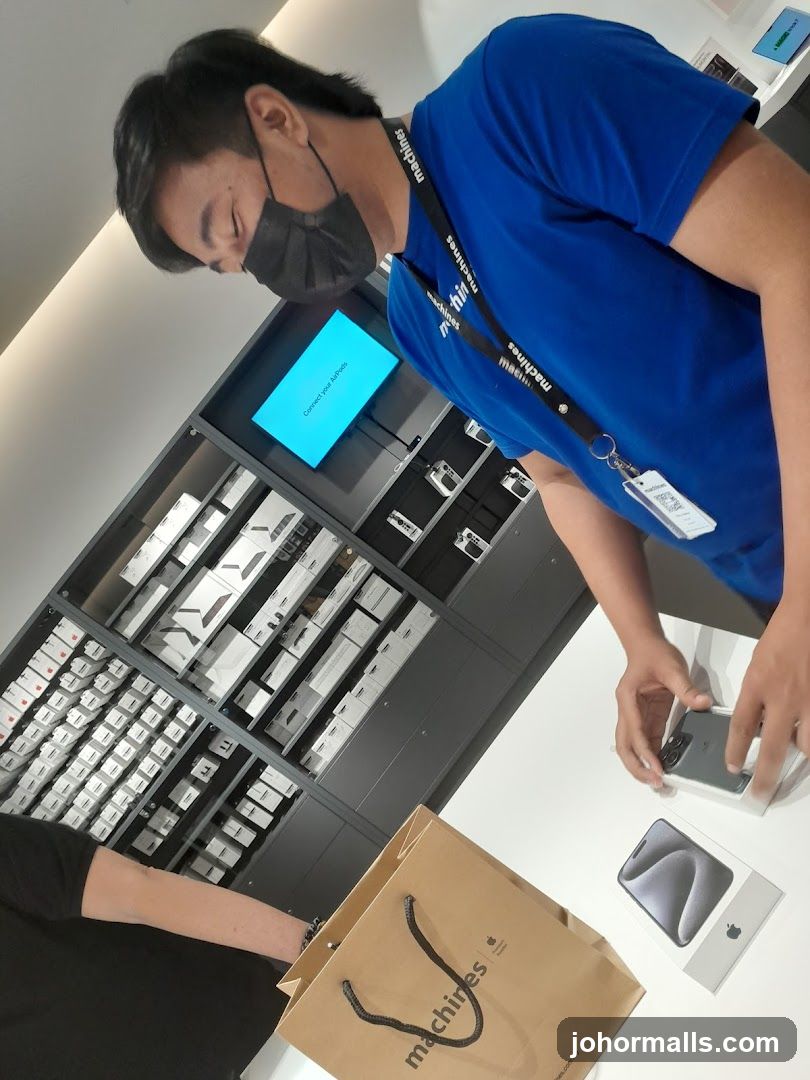 Store Employee Assisting Customer