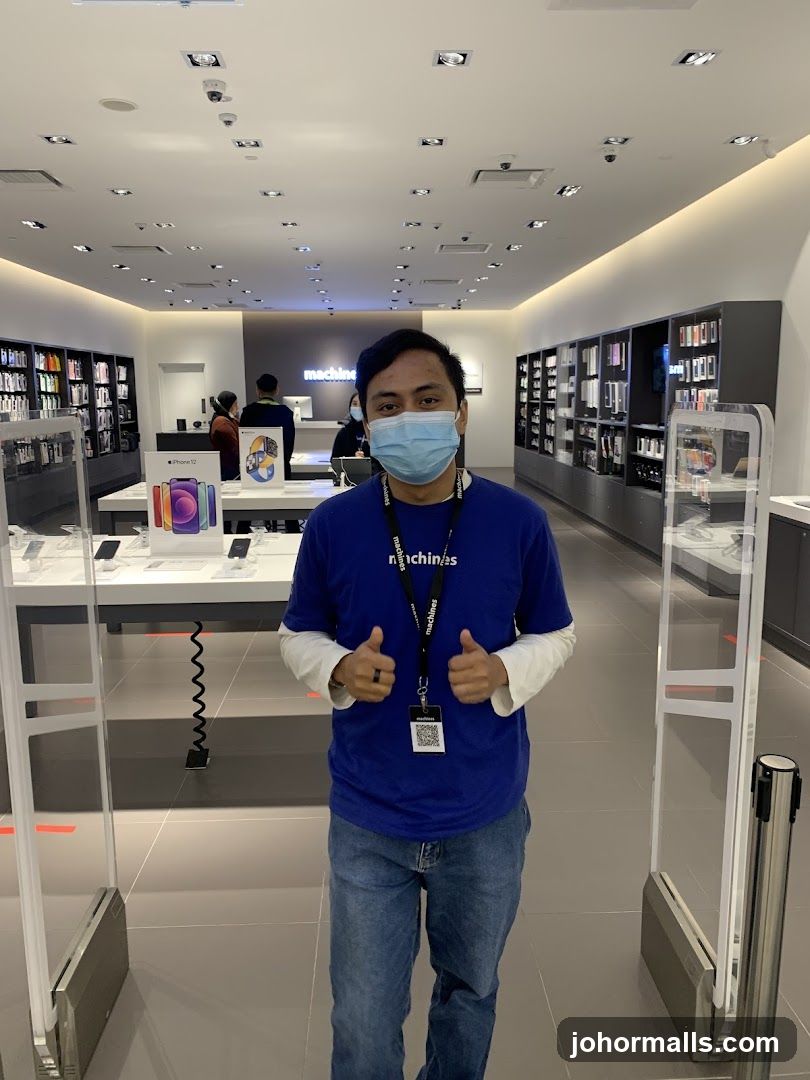 Store Employee Giving Thumbs Up