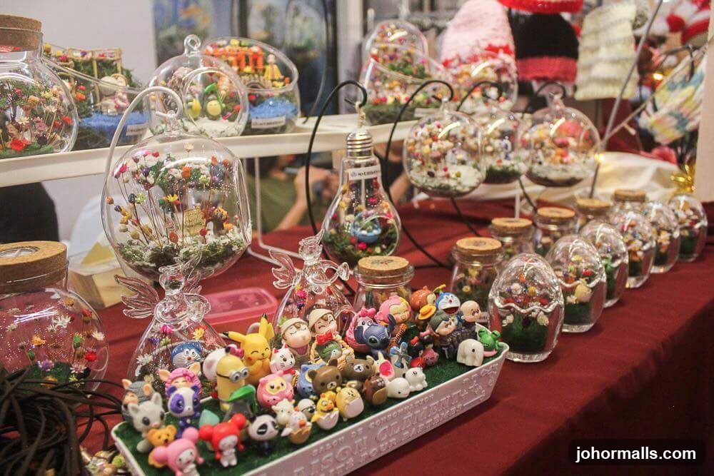 Display of Miniature Terrariums and Figurines