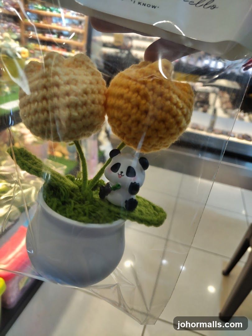 Crocheted Flowers with Panda Figurine