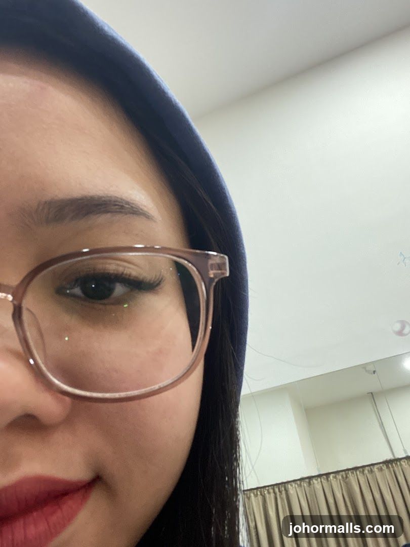 Close-up of a person wearing glasses