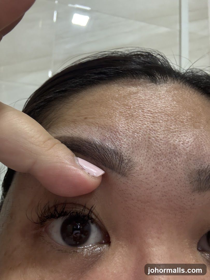 Close-up of a person's eye and forehead