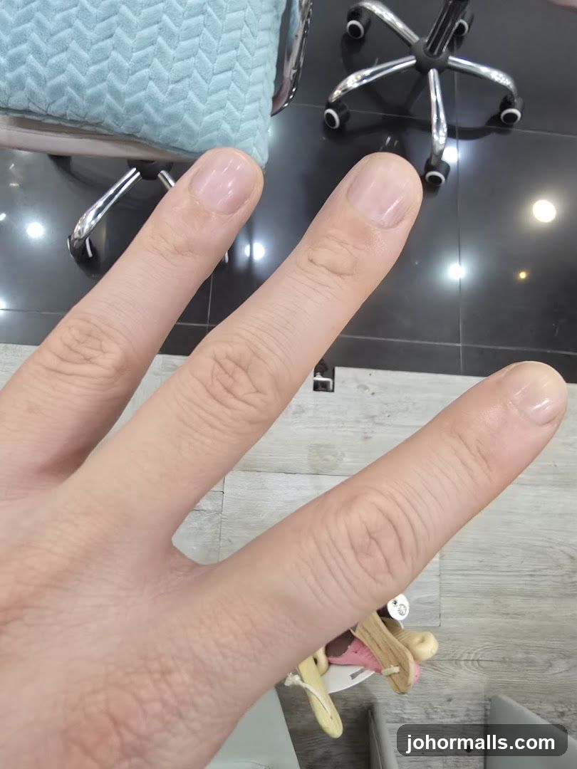 Hand with polished nails