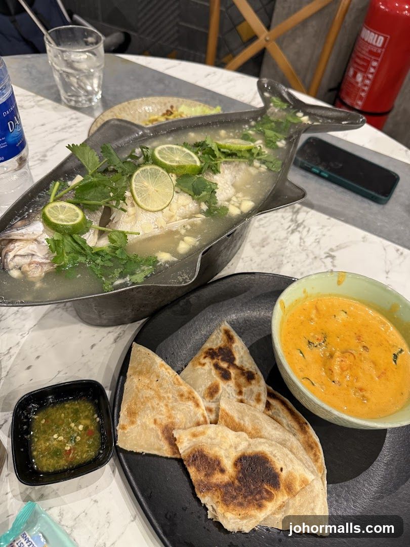 Thai Steamed Fish with Roti and Curry