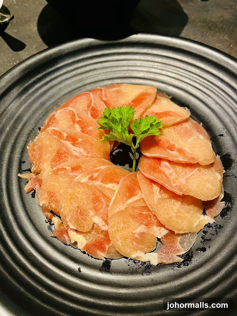 Thinly Sliced Meat on a Plate