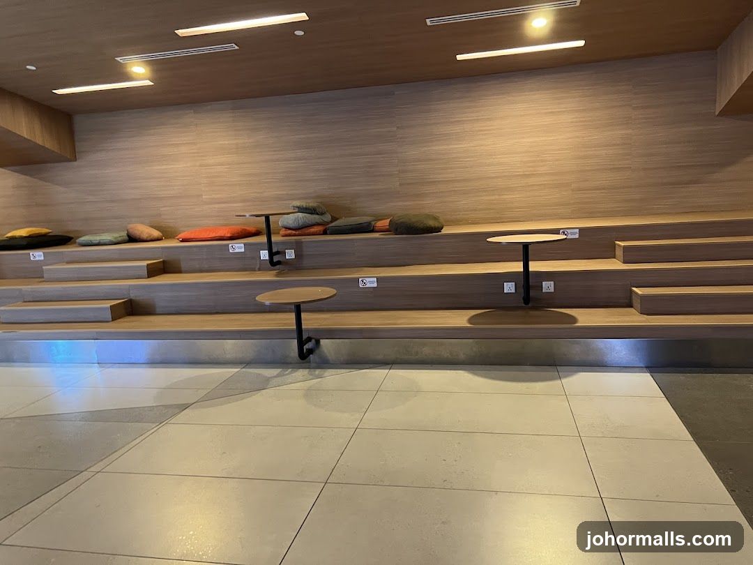 Tiered Seating Area with Cushions and Tables