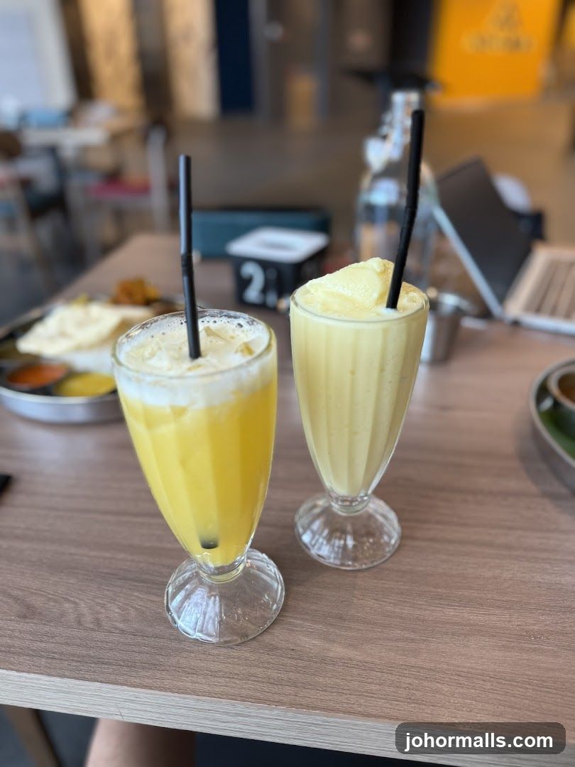 Two Yellow Drinks on a Table