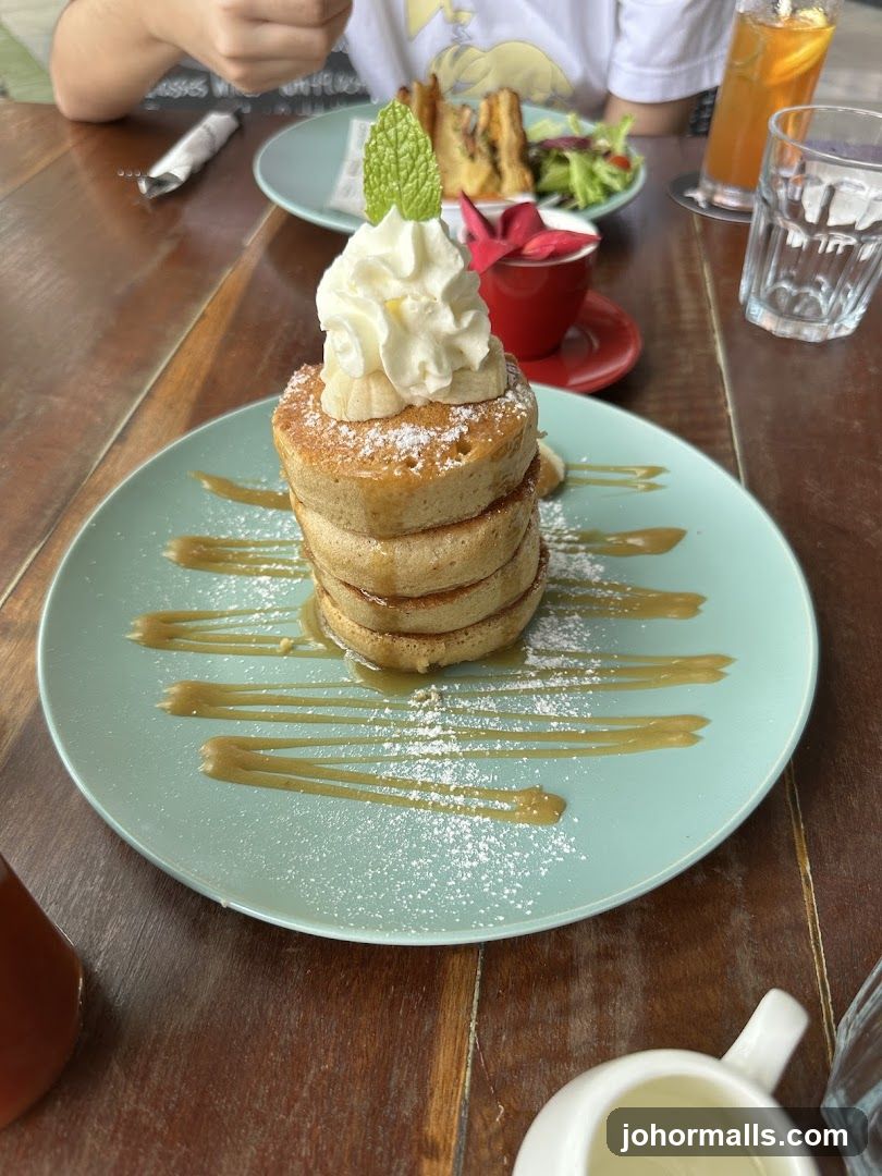Pancakes with Whipped Cream and Syrup