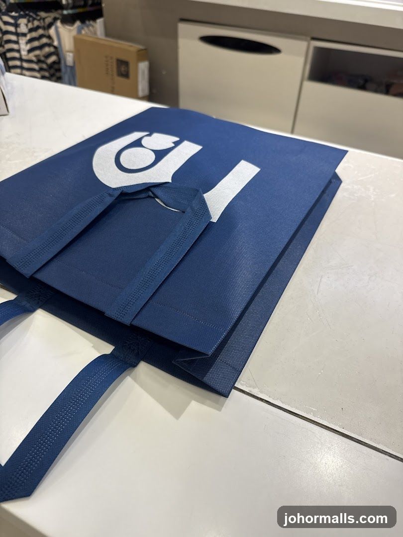 Blue shopping bag with logo