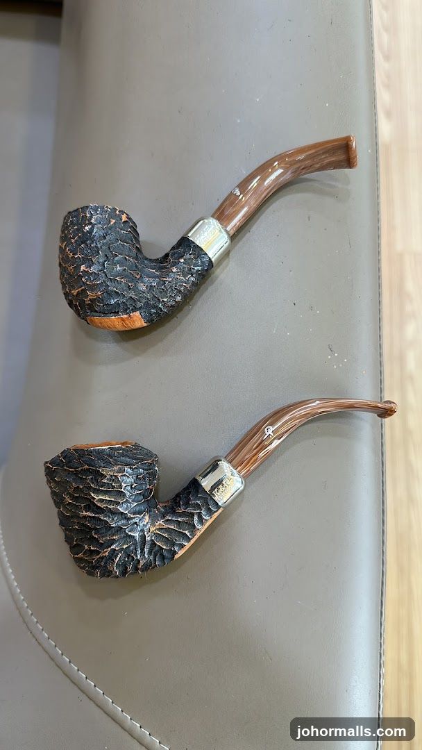 Two Smoking Pipes