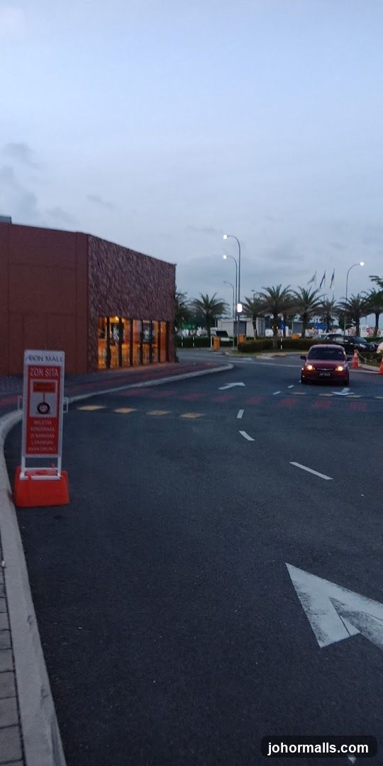 Road leading to a mall entrance