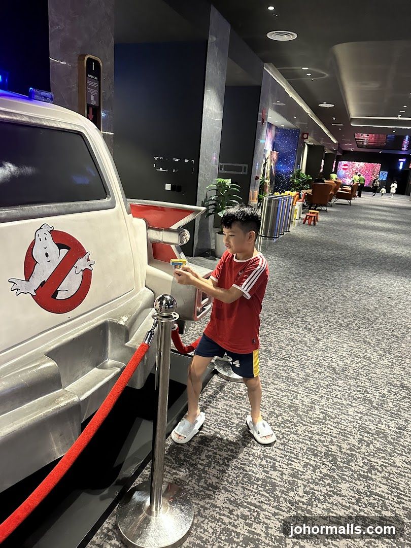 Boy with Ghostbusters Car Prop