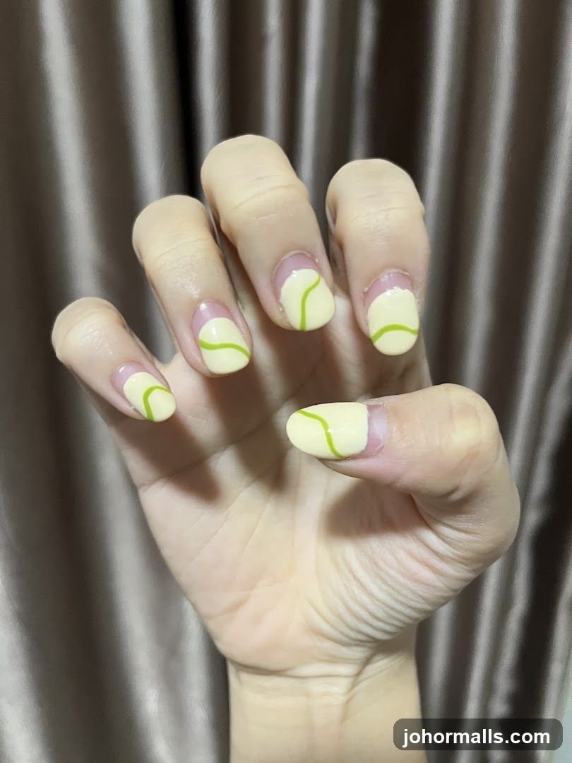Yellow and Green Swirl Nails