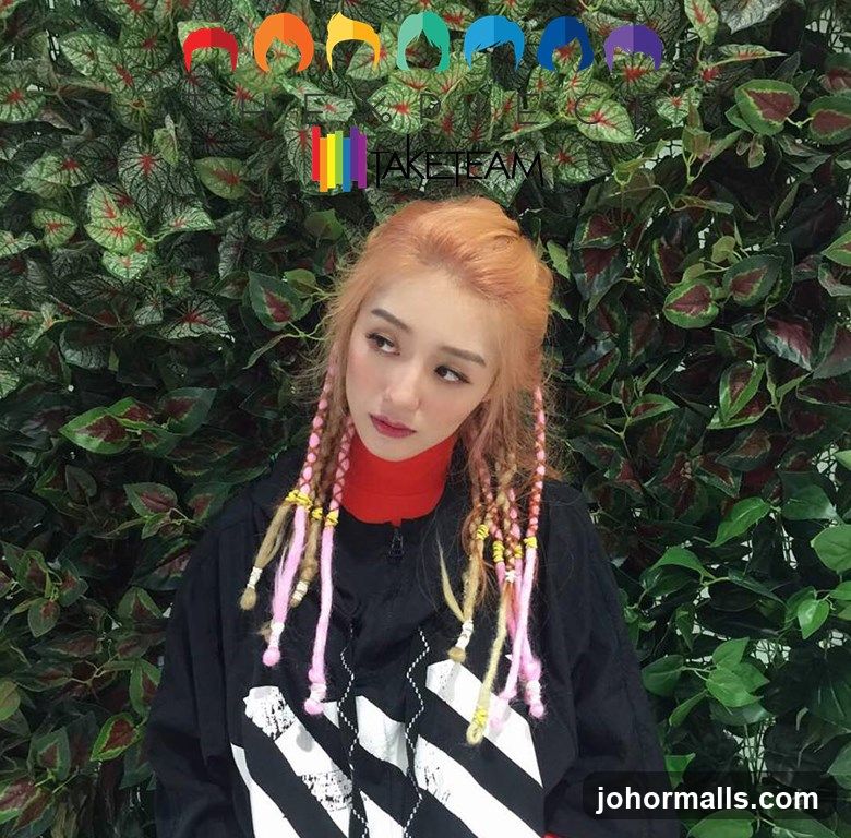 Woman with Braids and Logo