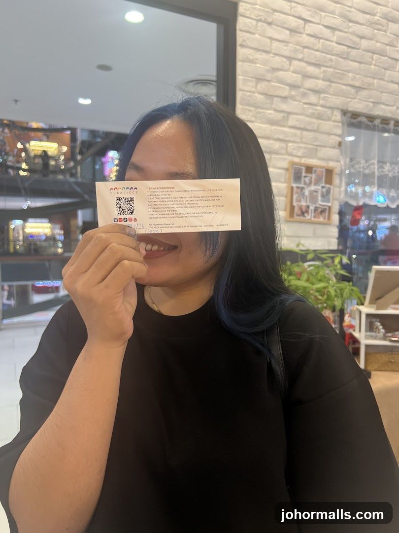 Woman Holding a Voucher