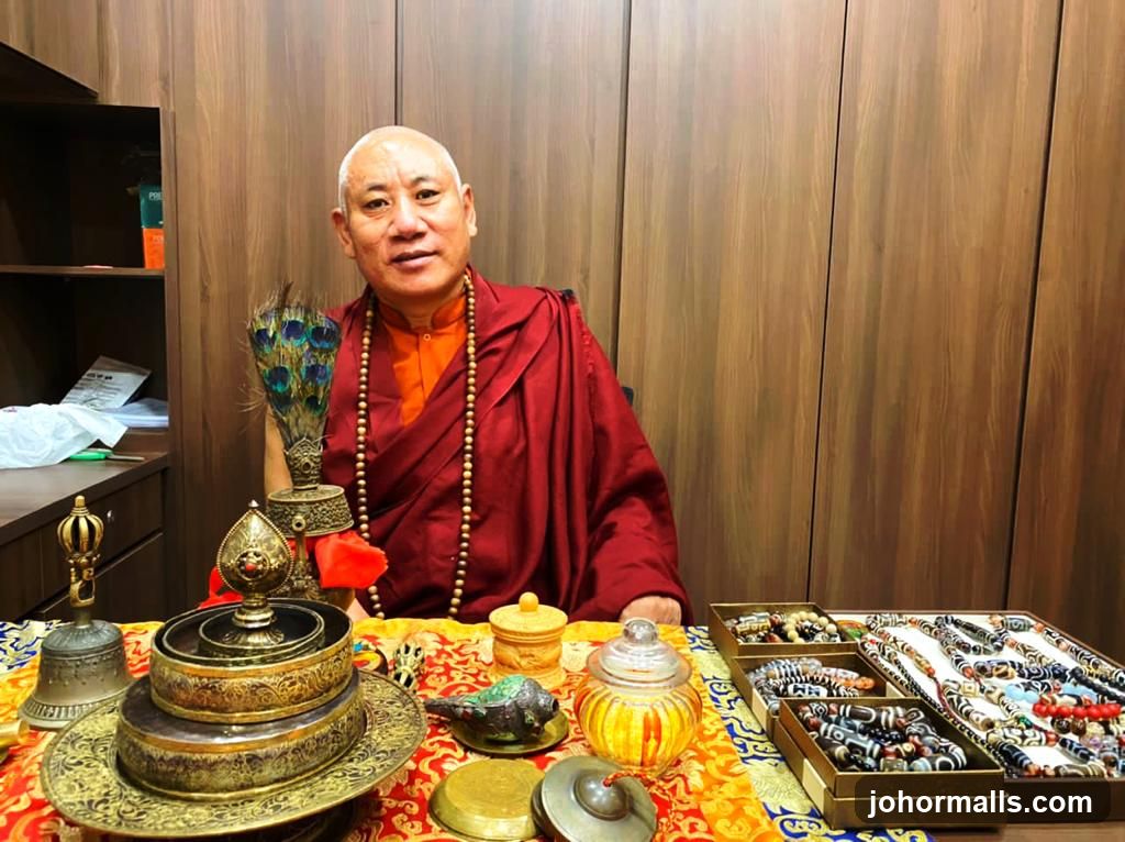 Monk with Buddhist artifacts