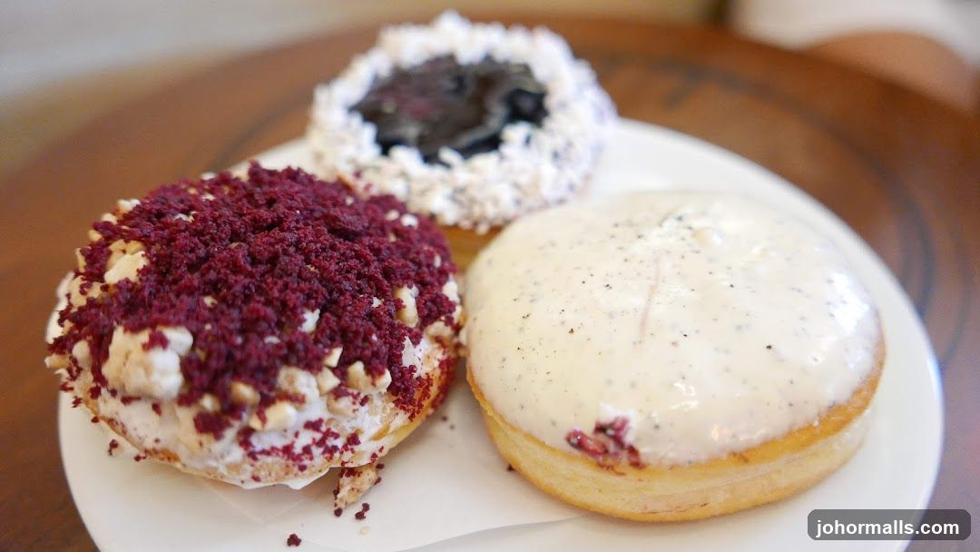 Three donuts on a plate