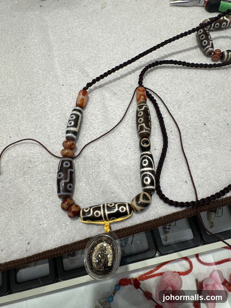 Tibetan Dzi Bead Necklace with Buddha Pendant
