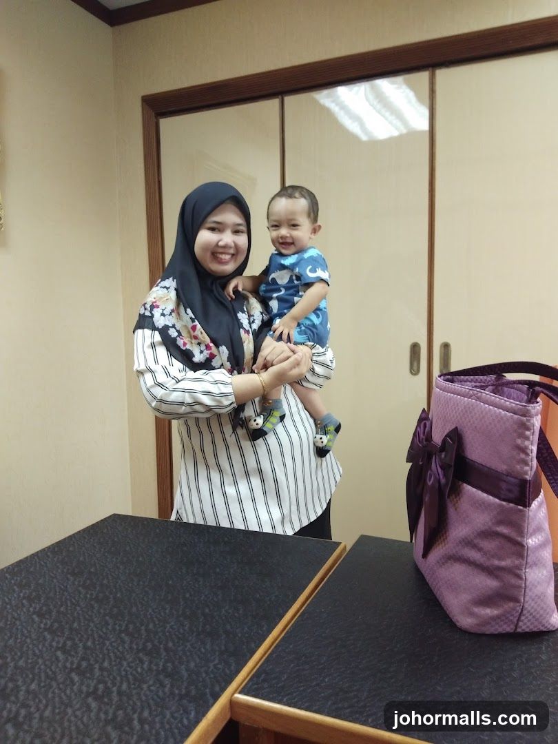 Woman holding a baby