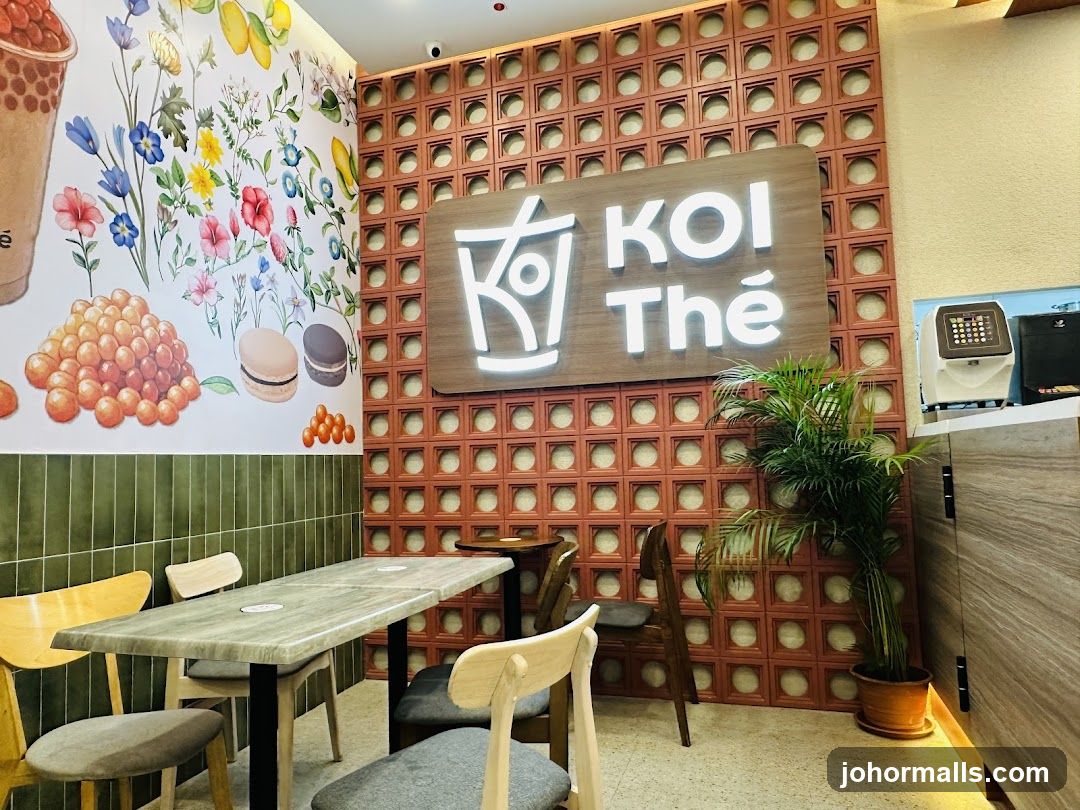Interior of a cafe with KOI The branding