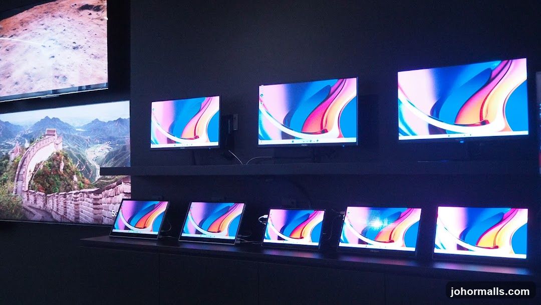 Computer Monitors Displaying Abstract Art