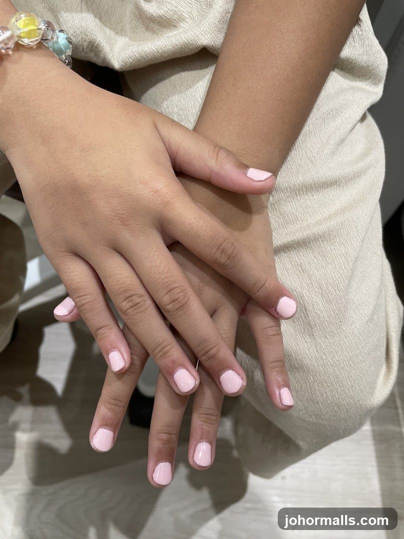 Hands with Pink Nail Polish