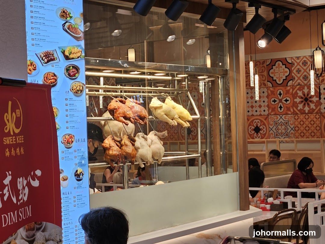 Restaurant Interior with Roasted Chickens and Menu