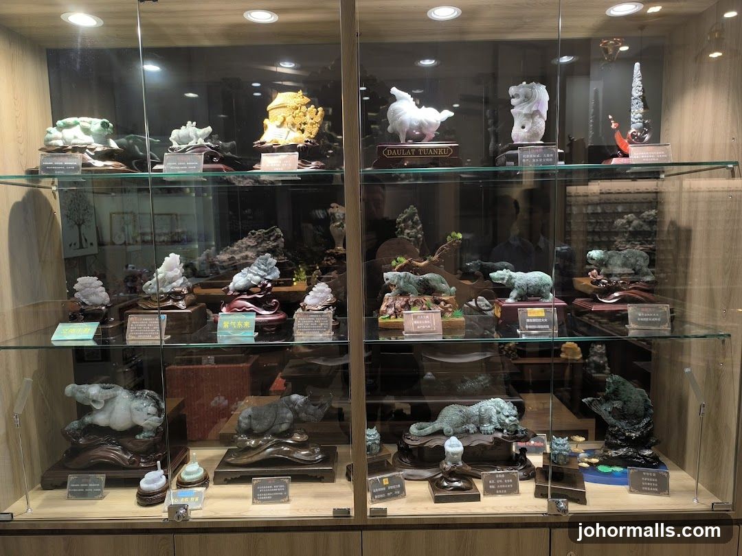 Display Case with Carved Sculptures
