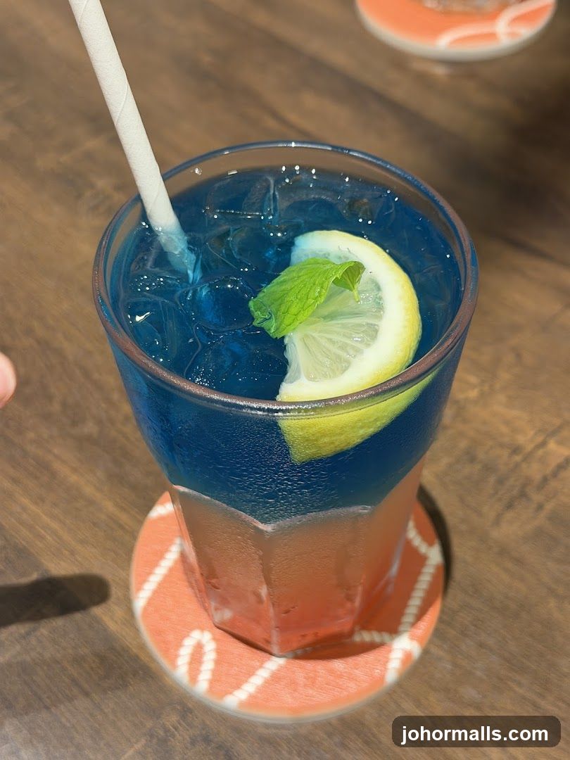 Blue and Orange Drink with Lemon and Mint