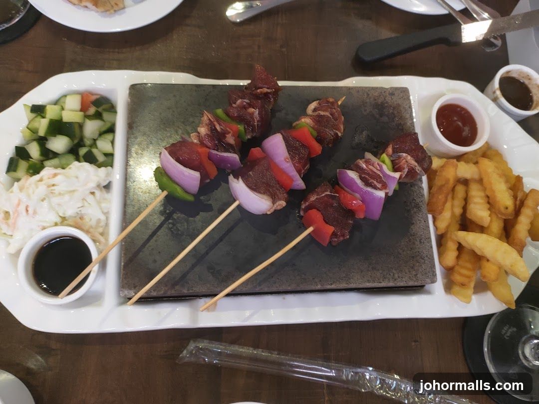 Beef Skewers with Fries and Salad