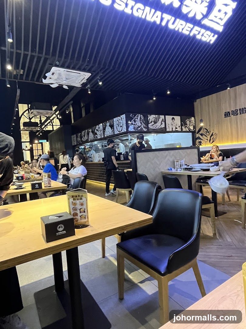 Restaurant Interior with Diners and Kitchen Staff
