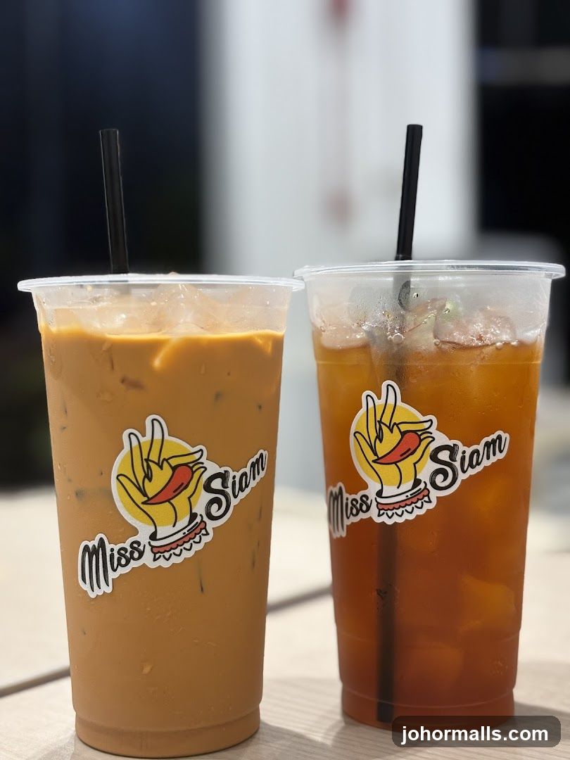 Two iced drinks with stickers