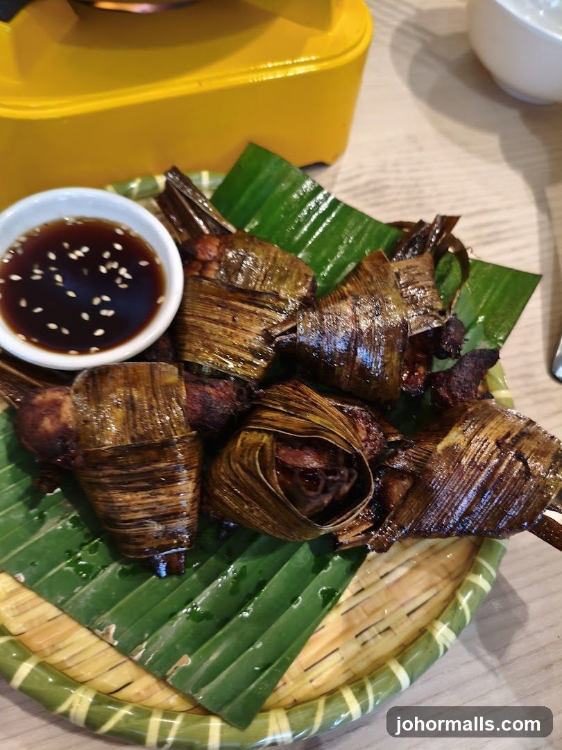 Chicken wrapped in pandan leaves