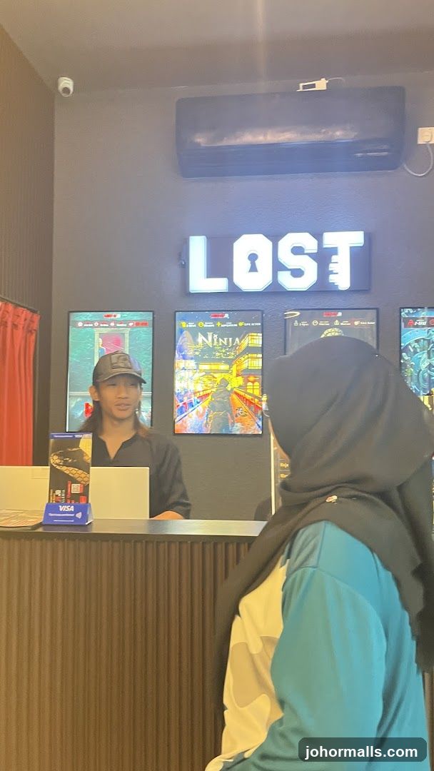 Reception desk with staff and posters
